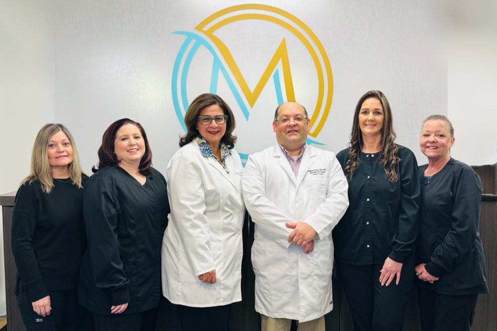 Mid-Maryland Oral & Maxillofacial Surgery team with oral surgeon in Frederick, MD.